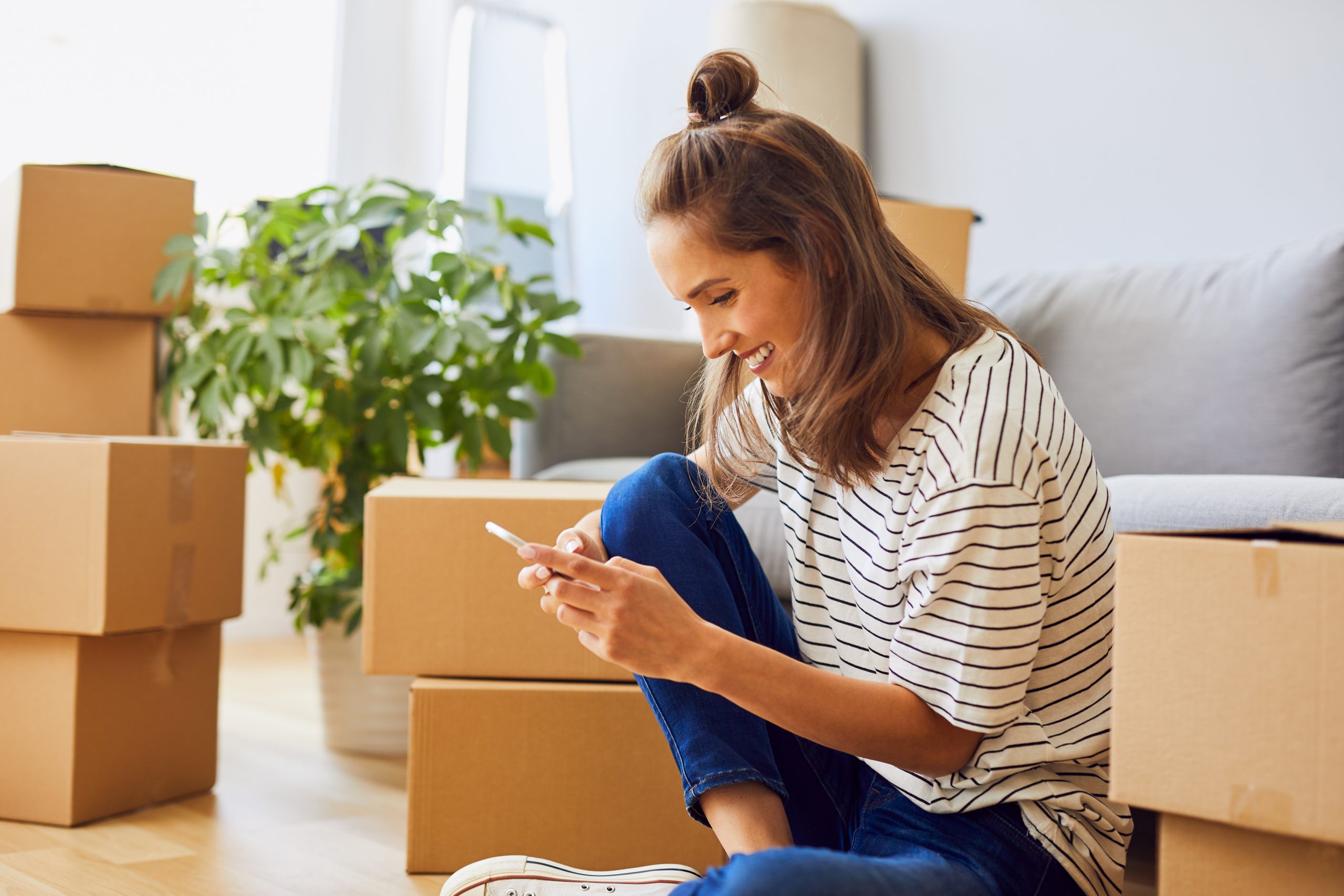 Woman happy after moving into rented property